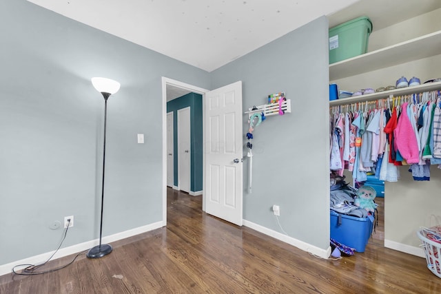 1293 Gresham Rd, Columbus, OH 43204 - unfurnished bedroom with wood finished floors and a closet