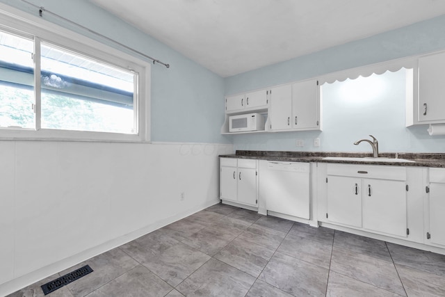 1293 Gresham Rd, Columbus, OH 43204 - kitchen with white appliances and white cabinets