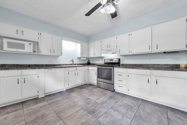 1293 Gresham Rd, Columbus, OH 43204 - kitchen with white appliances, under cabinet range hood, ceiling fan, and white cabinetry
