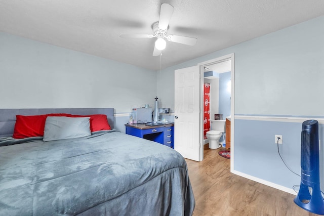 1293 Gresham Rd, Columbus, OH 43204 - bedroom featuring wood finished floors, ensuite bath, and ceiling fan