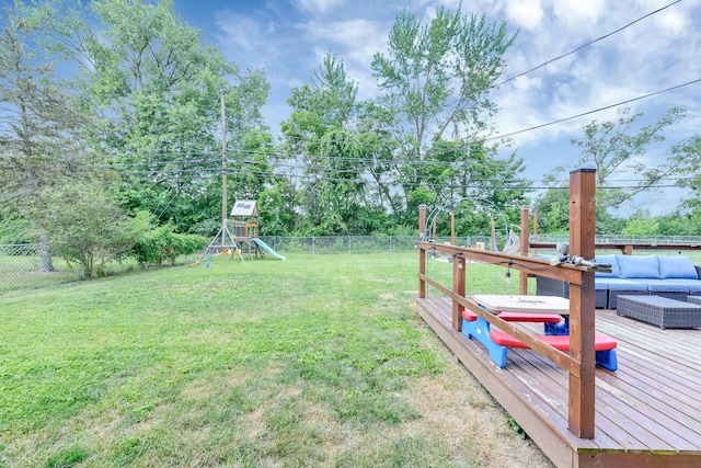 1293 Gresham Rd, Columbus, OH 43204 - fenced backyard featuring outdoor lounge area, a playground, and a deck