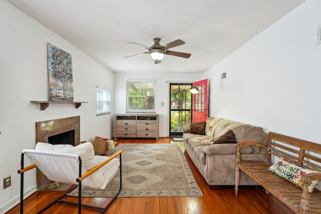 1317 Broadview Ave, Columbus, OH 43212 - living area with wood finished floors, a ceiling fan, and a fireplace