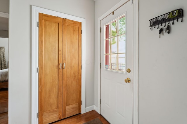 1317 Broadview Ave, Columbus, OH 43212 - doorway to outside featuring dark wood finished floors and baseboards