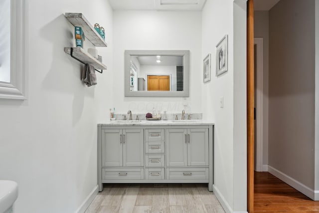 1317 Broadview Ave, Columbus, OH 43212 - bathroom with double vanity and wood finished floors