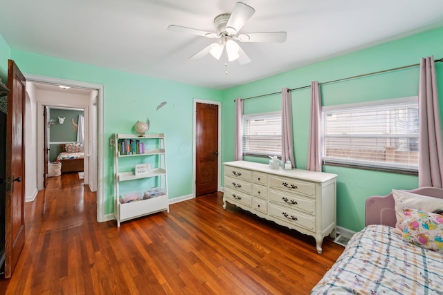 1317 Broadview Ave, Columbus, OH 43212 - bedroom with dark wood finished floors, ceiling fan, and a closet