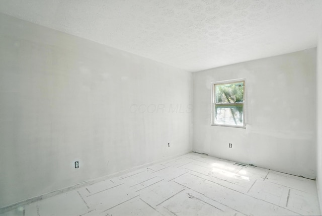 31 S Wheatland Ave, Columbus, OH 43204 - spare room featuring a textured ceiling