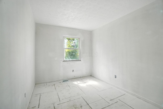 31 S Wheatland Ave, Columbus, OH 43204 - spare room with a textured ceiling and baseboards