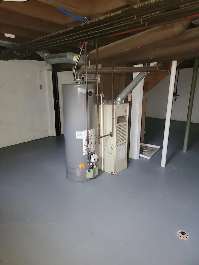 4867 Foxcroft Ct, Columbus, OH 43232 - unfinished below grade area with gas water heater