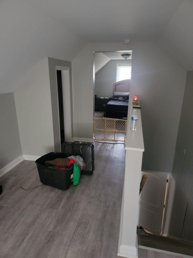 1922 Gault St, Columbus, OH 43205 - additional living space with vaulted ceiling and wood finished floors