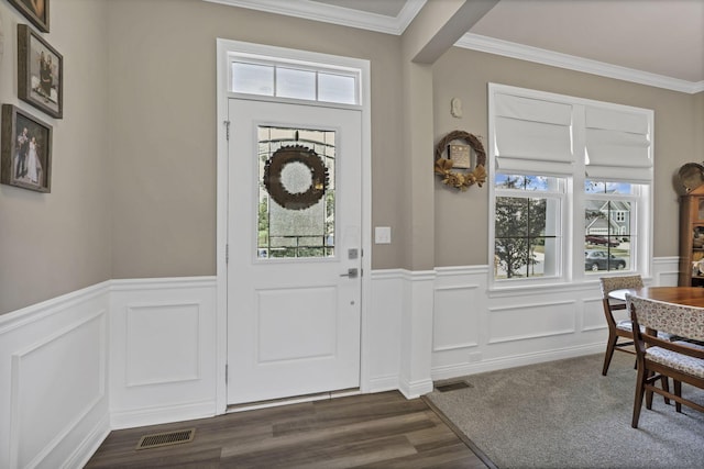 7250 Konold Ct, Canal Winchester, OH 43110 - foyer entrance featuring dark wood-style flooring, a wainscoted wall, crown molding, and a decorative wall