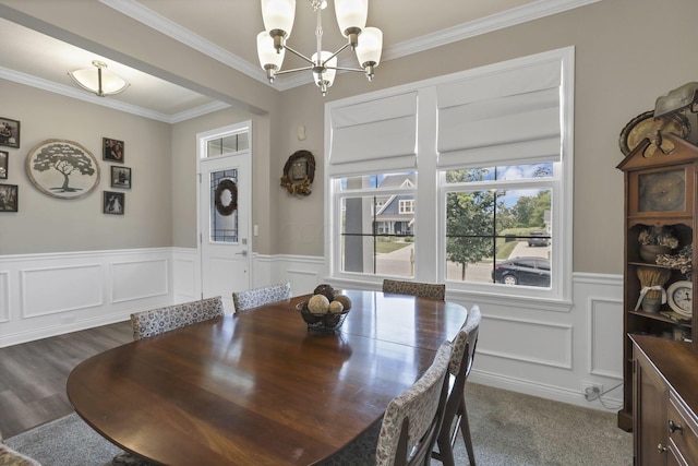 7250 Konold Ct, Canal Winchester, OH 43110 - dining room with a chandelier, crown molding, a wainscoted wall, and a decorative wall