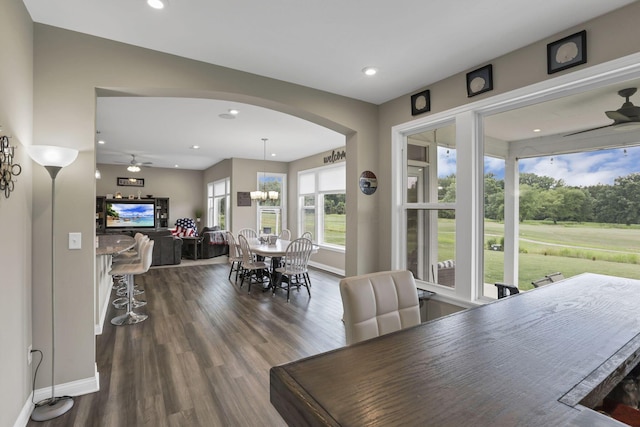 7250 Konold Ct, Canal Winchester, OH 43110 - dining space featuring a ceiling fan, arched walkways, dark wood-style flooring, and recessed lighting