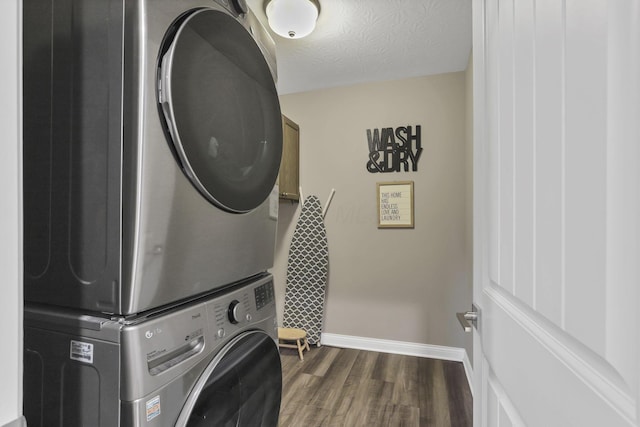 7250 Konold Ct, Canal Winchester, OH 43110 - laundry area with stacked washing machine and dryer and dark wood-style floors