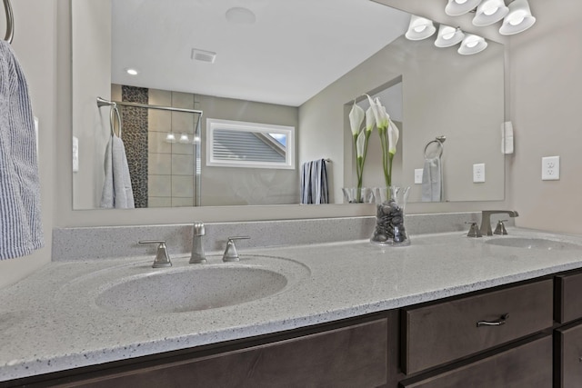 7250 Konold Ct, Canal Winchester, OH 43110 - bathroom featuring double vanity and a shower stall