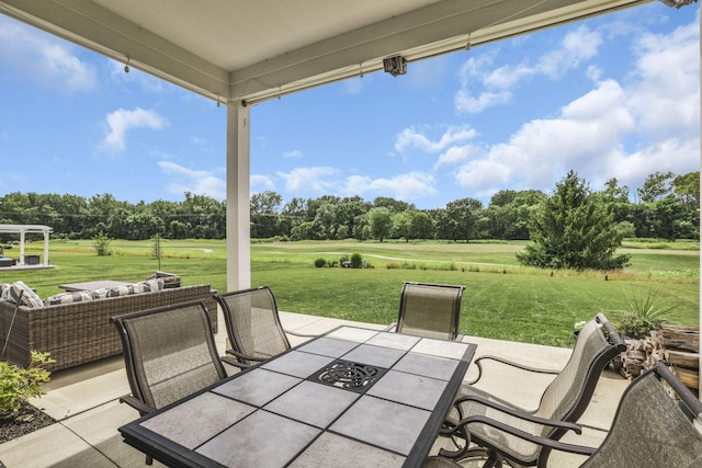 7250 Konold Ct, Canal Winchester, OH 43110 - view of patio featuring outdoor dining area, view of scattered trees, and outdoor lounge area