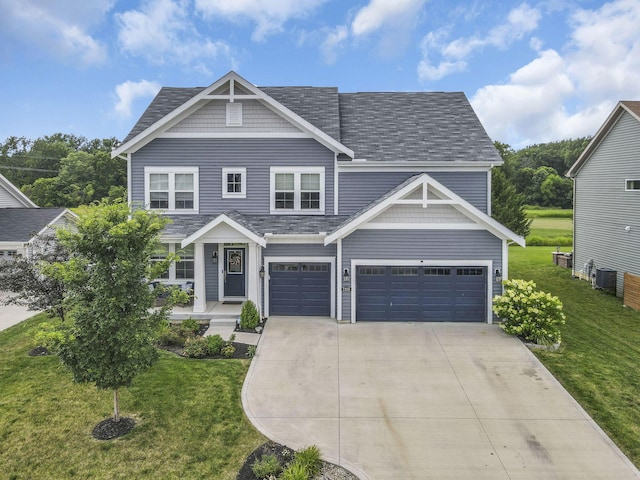 7250 Konold Ct, Canal Winchester, OH 43110 - view of front facade with concrete driveway, a front lawn, covered porch, and roof with shingles