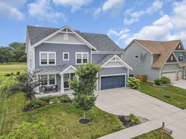 7250 Konold Ct, Canal Winchester, OH 43110 - craftsman inspired home with concrete driveway, a front yard, a porch, and an attached garage