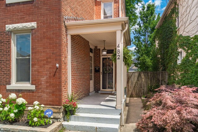 482 E Whittier St, Columbus, OH 43206 - entrance to property with brick siding and covered porch
