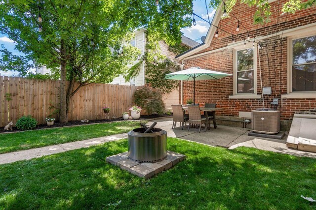 482 E Whittier St, Columbus, OH 43206 - fenced yard featuring a patio area