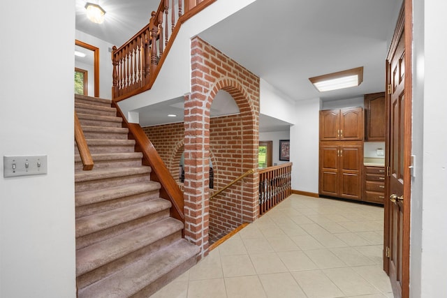 1178 London Rd, West Jefferson, OH 43162 - foyer with light tile patterned floors and stairway