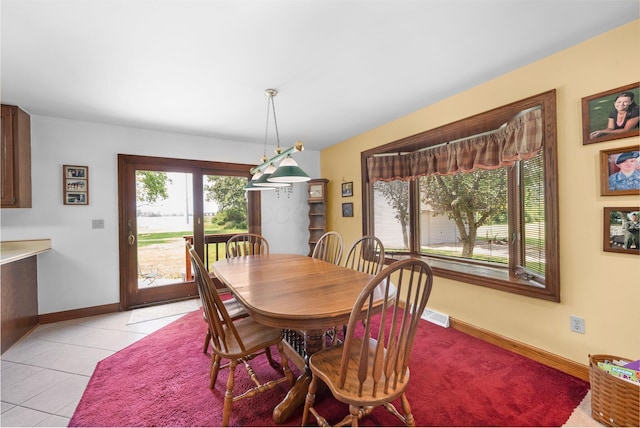 1178 London Rd, West Jefferson, OH 43162 - dining space featuring baseboards and light tile patterned floors