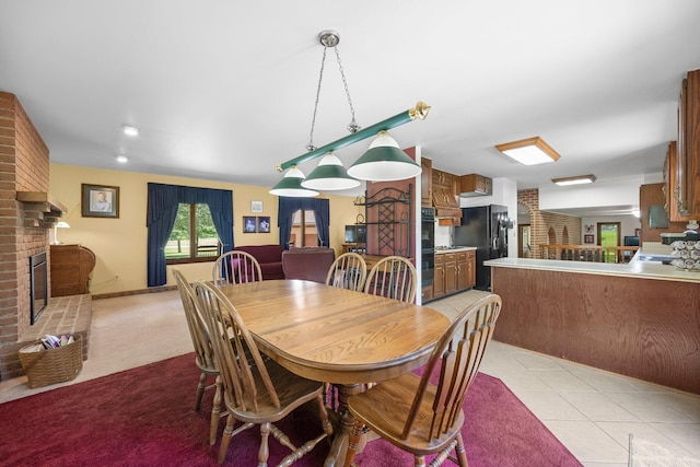 1178 London Rd, West Jefferson, OH 43162 - dining room with a brick fireplace