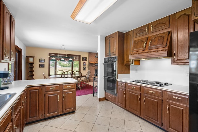1178 London Rd, West Jefferson, OH 43162 - kitchen with black appliances, light countertops, light tile patterned flooring, and a peninsula