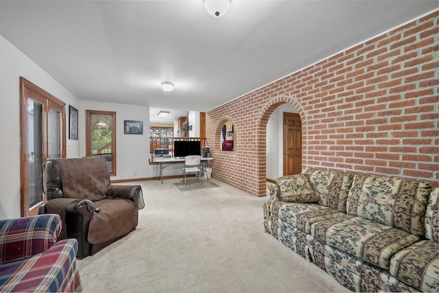1178 London Rd, West Jefferson, OH 43162 - carpeted living area with brick wall and a desk