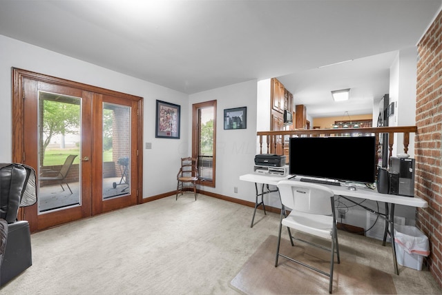 1178 London Rd, West Jefferson, OH 43162 - carpeted home office featuring french doors, plenty of natural light, and brick wall