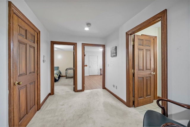 1178 London Rd, West Jefferson, OH 43162 - hallway with baseboards and light carpet