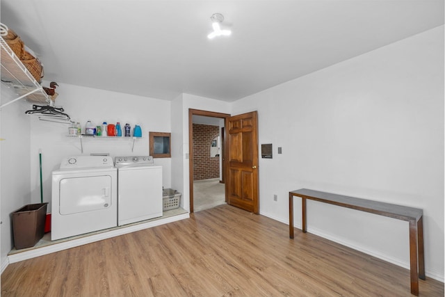 1178 London Rd, West Jefferson, OH 43162 - laundry area featuring separate washer and dryer and light wood finished floors