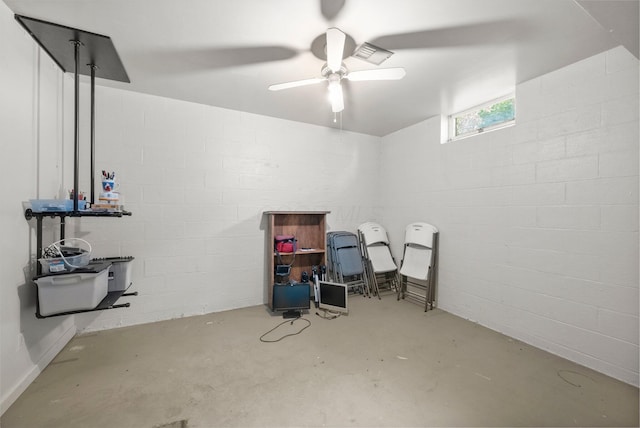 1178 London Rd, West Jefferson, OH 43162 - below grade area with a ceiling fan and concrete block wall