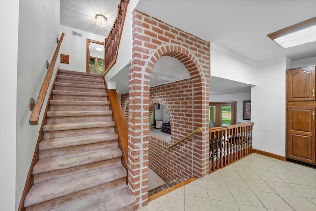 1178 London Rd, West Jefferson, OH 43162 - stairs featuring tile patterned flooring and baseboards