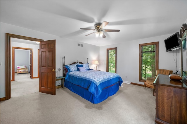 1178 London Rd, West Jefferson, OH 43162 - bedroom with light carpet and a ceiling fan