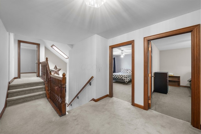 1178 London Rd, West Jefferson, OH 43162 - hallway with light carpet and an upstairs landing