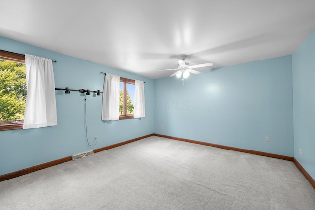 1178 London Rd, West Jefferson, OH 43162 - spare room featuring a ceiling fan and carpet floors