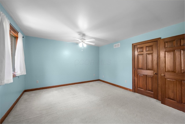 1178 London Rd, West Jefferson, OH 43162 - unfurnished bedroom featuring light carpet and ceiling fan