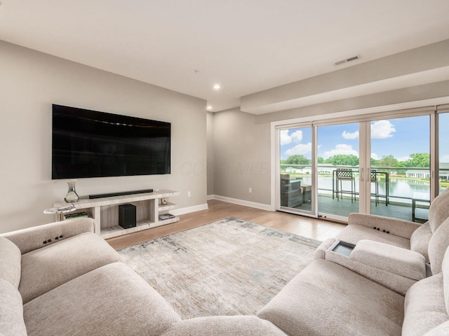 5285 Highpointe Lakes Dr Unit 201, Westerville, OH 43081 - living area with wood finished floors, recessed lighting, and a water view