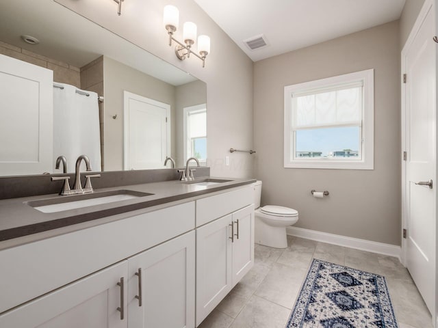 5285 Highpointe Lakes Dr Unit 201, Westerville, OH 43081 - bathroom with plenty of natural light, double vanity, and curtained shower