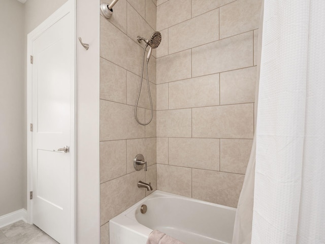 5285 Highpointe Lakes Dr Unit 201, Westerville, OH 43081 - bathroom with shower / bathtub combination with curtain and baseboards