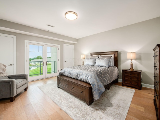 5285 Highpointe Lakes Dr Unit 201, Westerville, OH 43081 - bedroom with access to outside, light wood-type flooring, and french doors