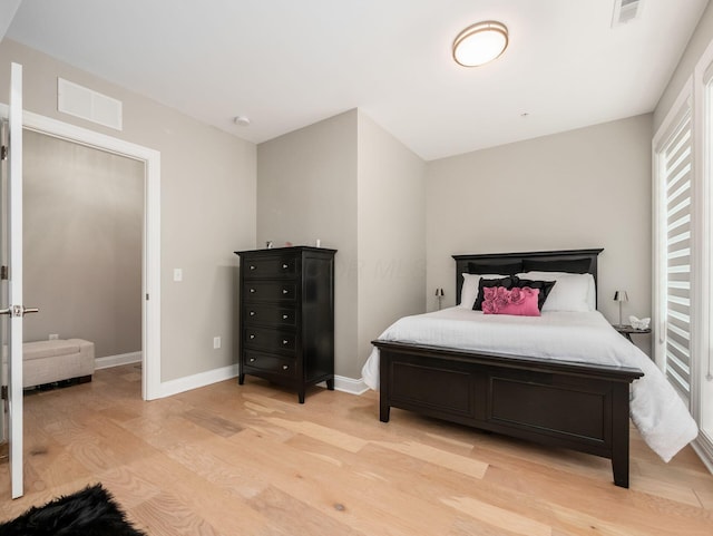 5285 Highpointe Lakes Dr Unit 201, Westerville, OH 43081 - bedroom with light wood-style flooring and baseboards
