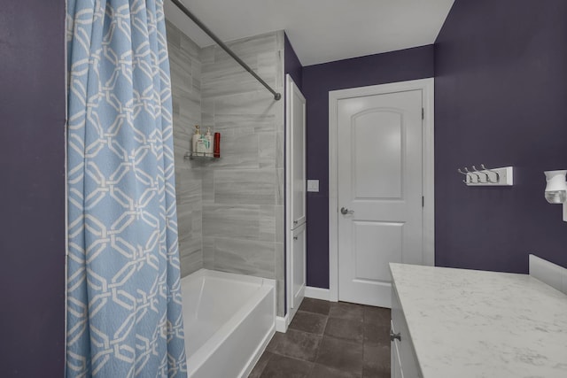2579 Wickliffe Rd, Columbus, OH 43221 - full bath with shower / bath combo with shower curtain, vanity, and tile patterned flooring