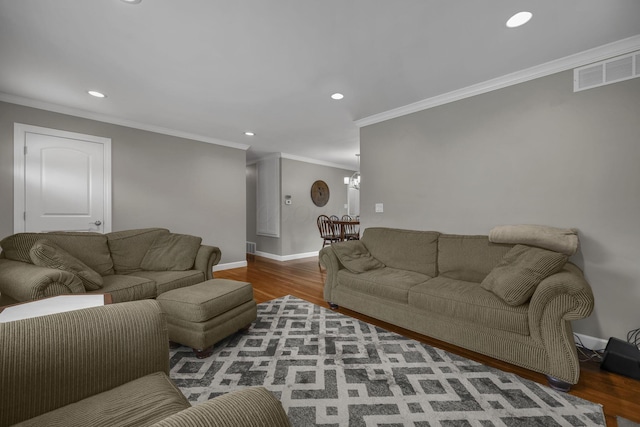 2579 Wickliffe Rd, Columbus, OH 43221 - living area with ornamental molding, wood finished floors, and recessed lighting