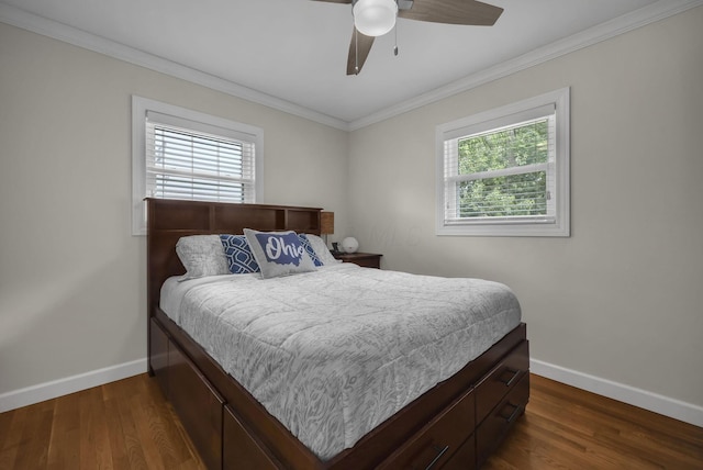 2579 Wickliffe Rd, Columbus, OH 43221 - bedroom featuring multiple windows, dark wood-style floors, ornamental molding, and ceiling fan