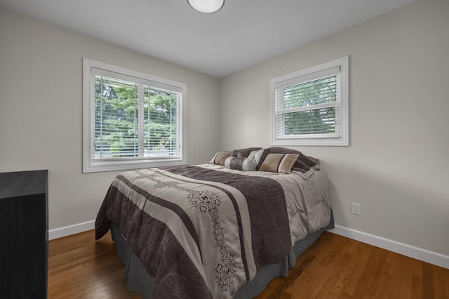 2579 Wickliffe Rd, Columbus, OH 43221 - bedroom with multiple windows and wood finished floors