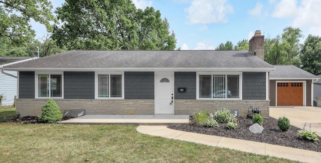 2579 Wickliffe Rd, Columbus, OH 43221 - view of front of property featuring stone siding, a front yard, a garage, and a shingled roof