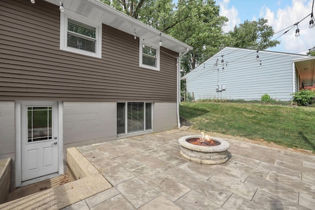 2579 Wickliffe Rd, Columbus, OH 43221 - back of property featuring a fire pit, a patio, and a yard