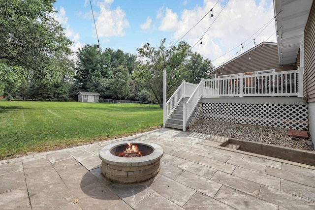2579 Wickliffe Rd, Columbus, OH 43221 - view of patio / terrace with an outdoor fire pit, stairway, a shed, and a deck