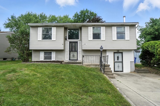 4143 Jonquil St, Columbus, OH 43224 - bi-level home featuring a front lawn